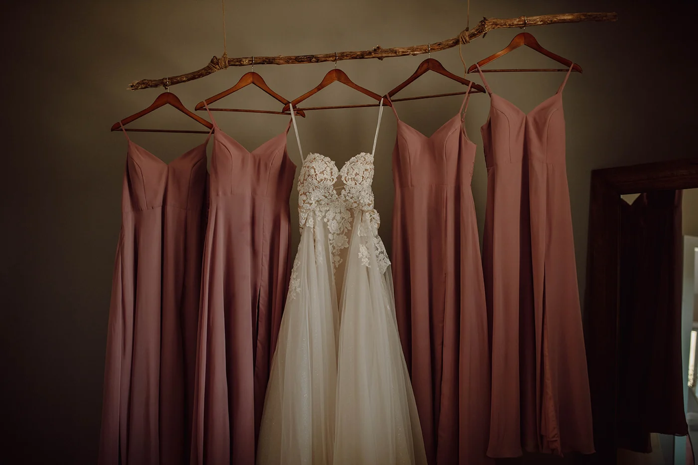 Wedding dress and dusty rose bridesmaid dresses