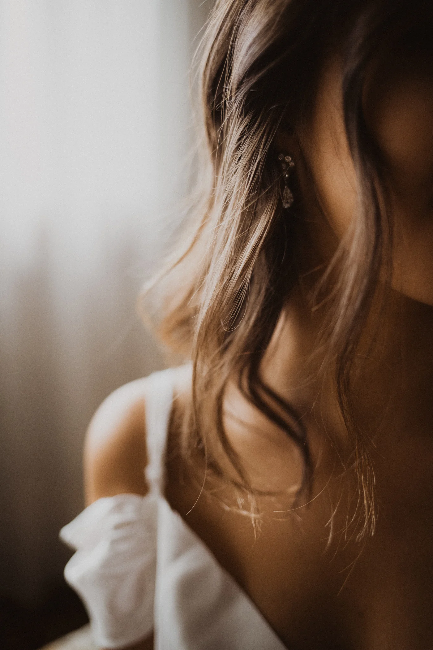 Bridal hair and wedding dress detail